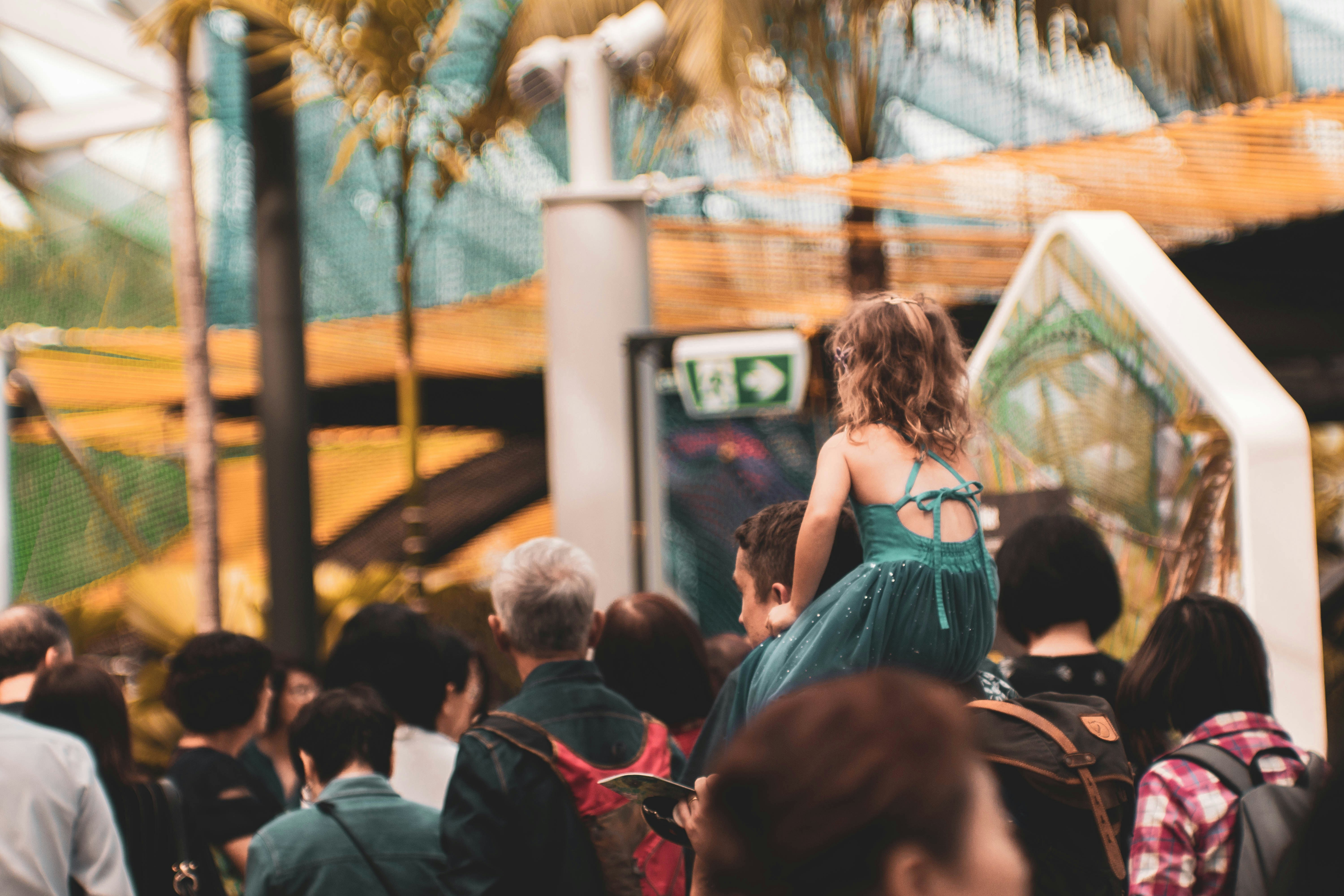 people near buildings during daytime