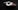 A video game controller with a sleek design, predominantly white with red and black accents. It sits on a dark wooden surface, with shadows enhancing its contours and details.
