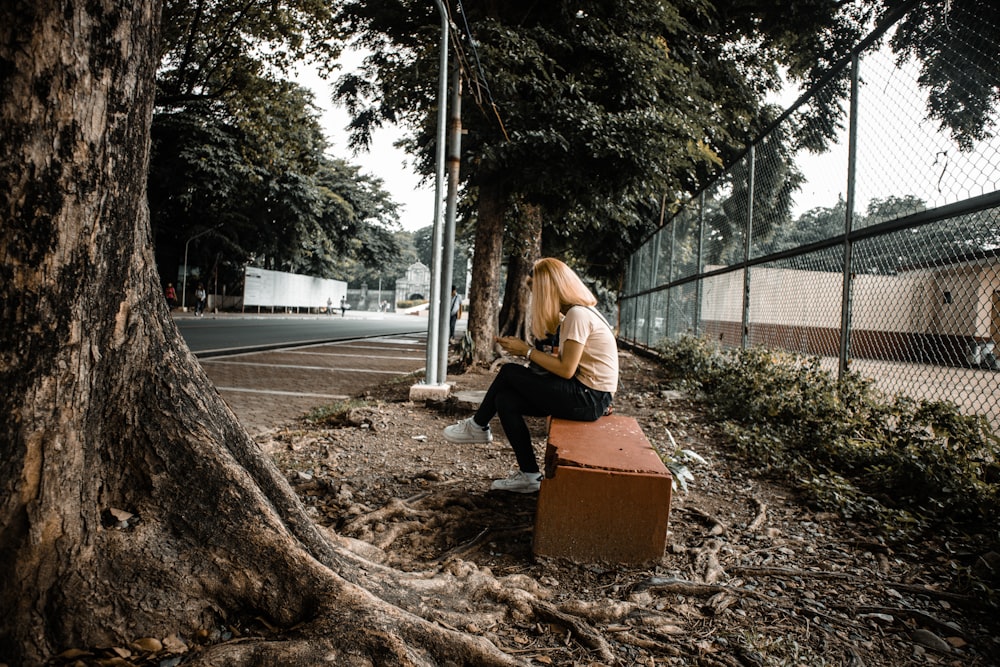 woman sitting on bench