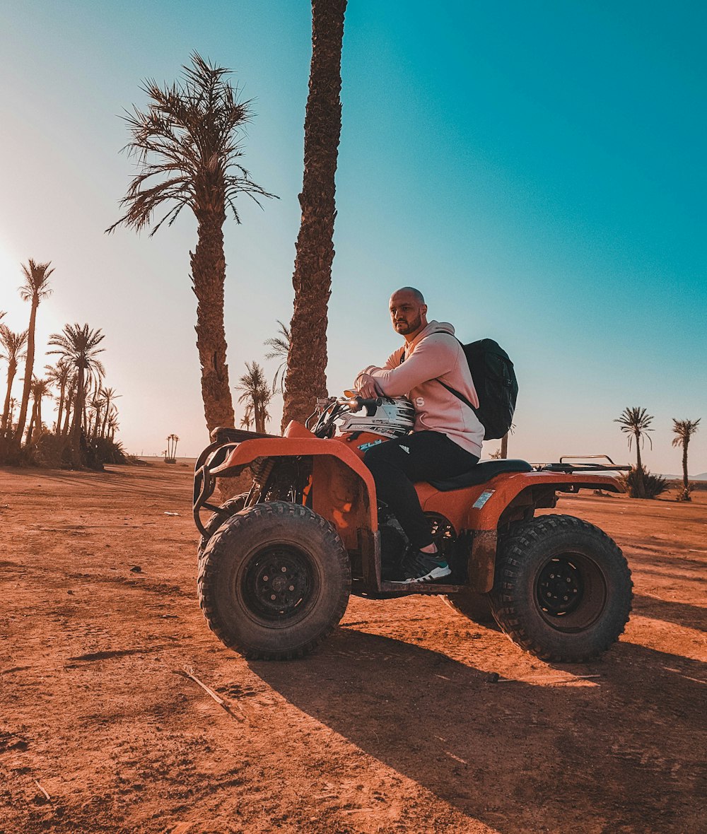 man riding on ATV