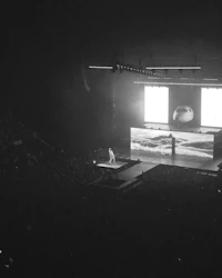 artist on stage during live event with Video screen & Projection mapping
