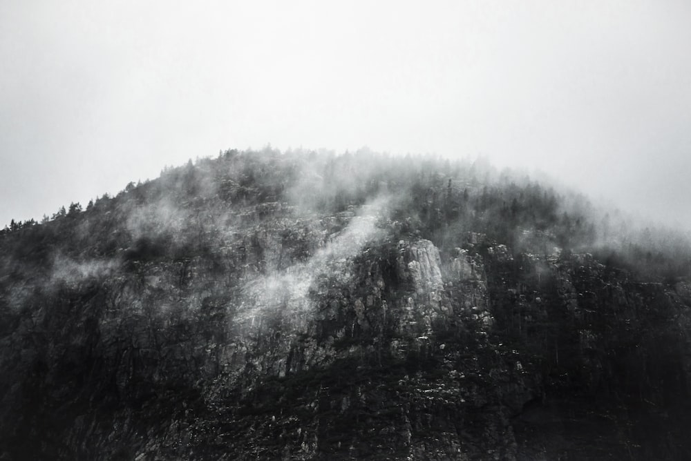 greyscale photography of mountain