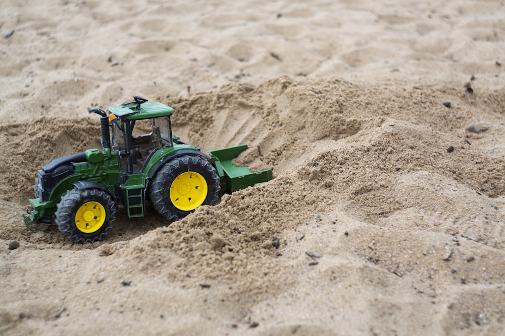 green and black tractor toy