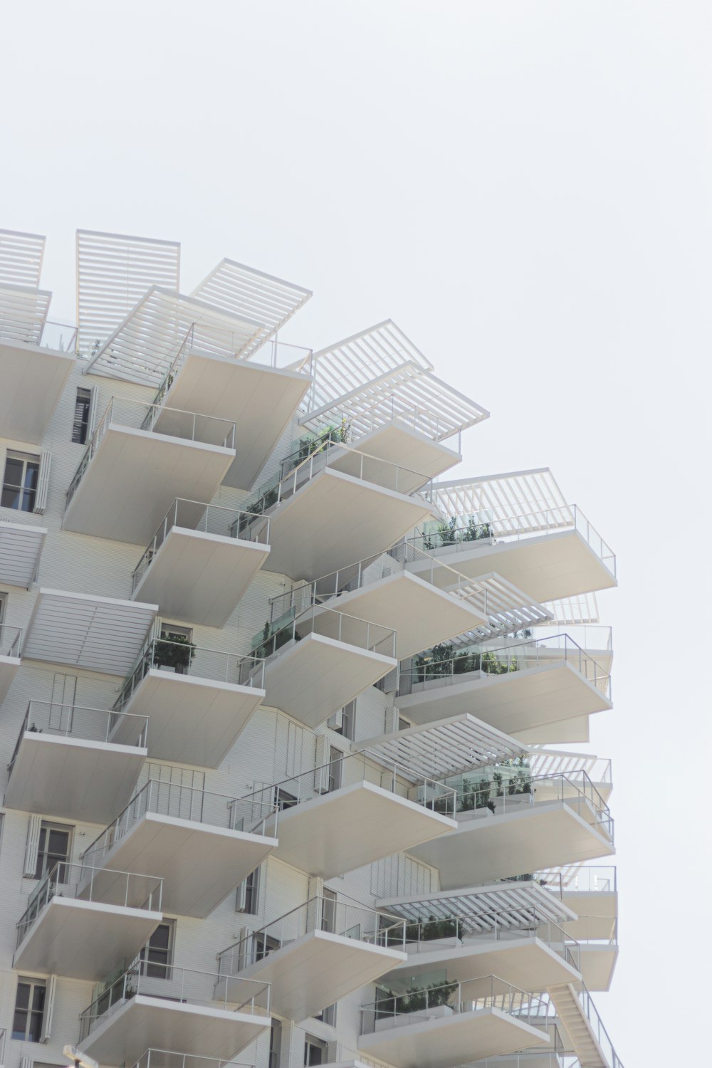 white high rise building with balconies