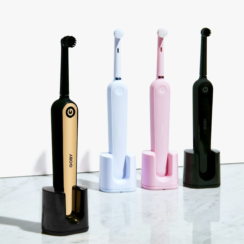 four electric toothbrushes