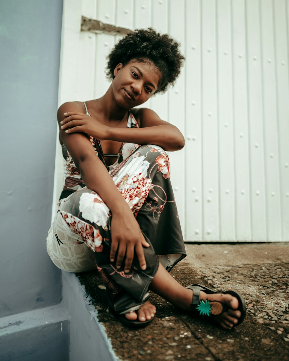 woman sitting on ground