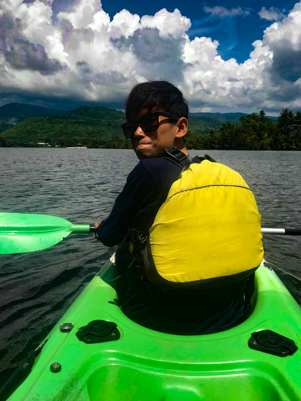 man riding on boat