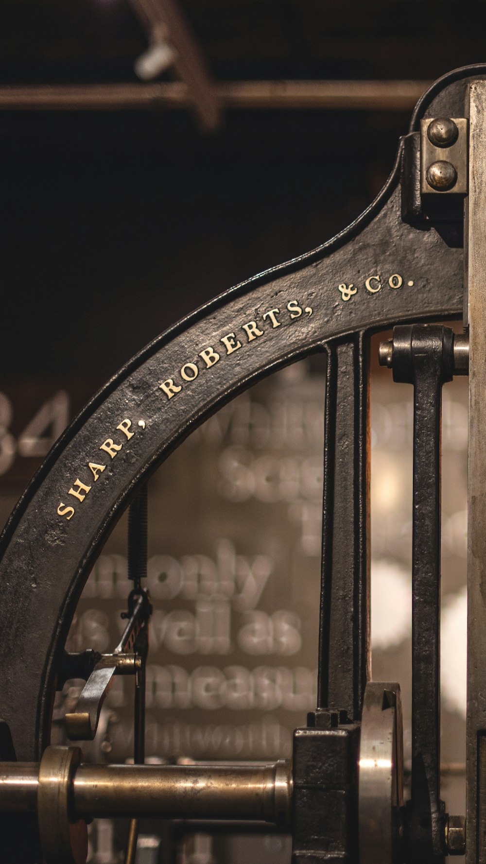 a close up of a metal gate with writing on it