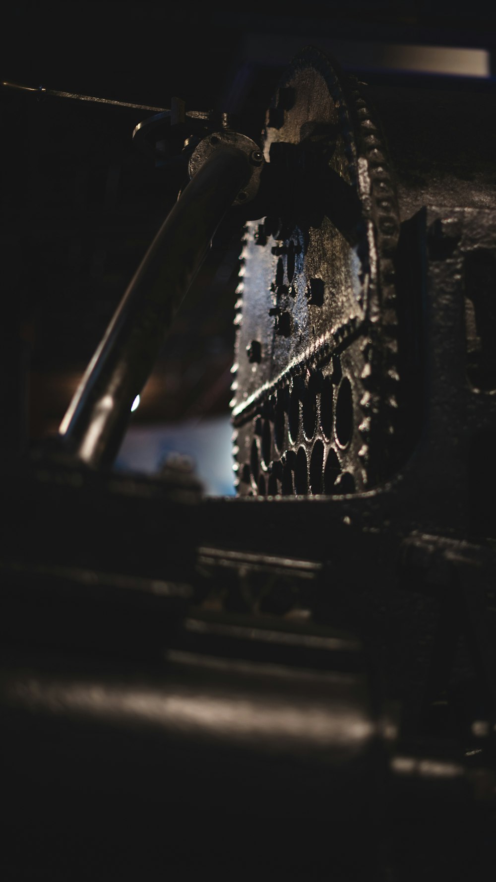 a black and white photo of gears in a machine