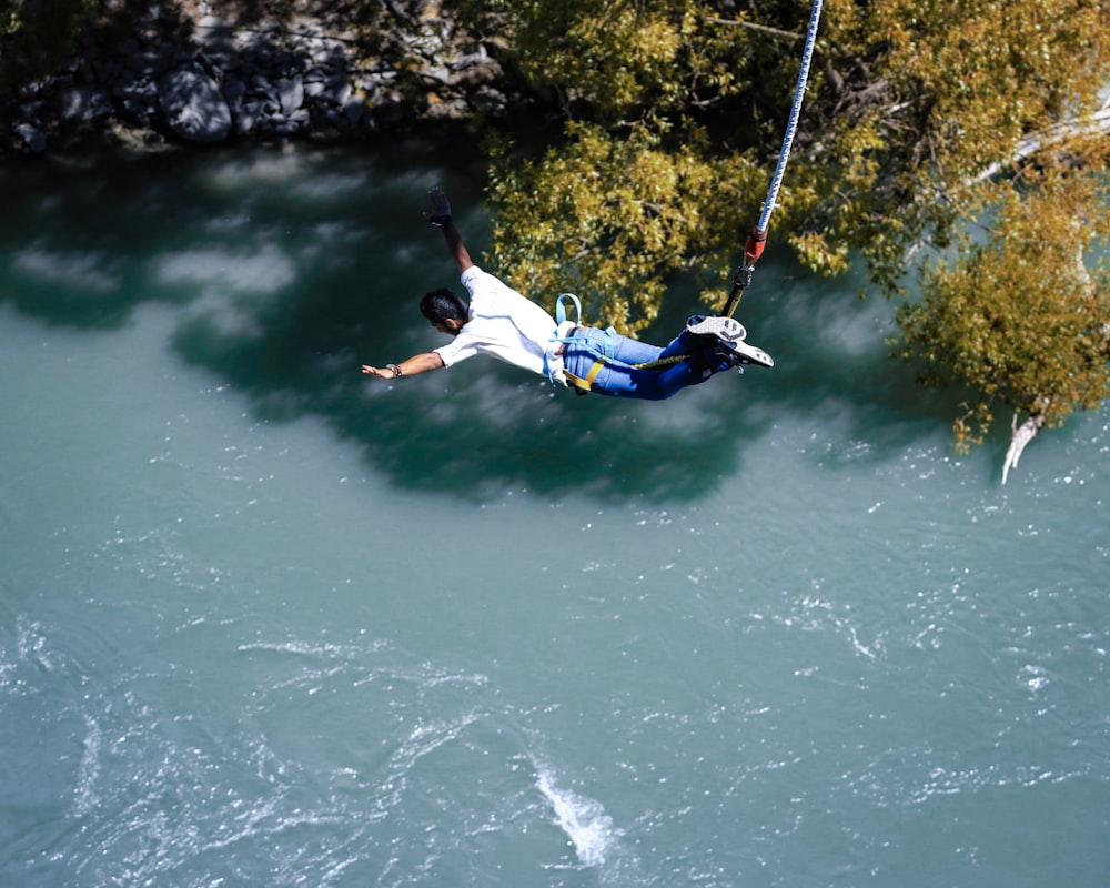 man bungee jumping