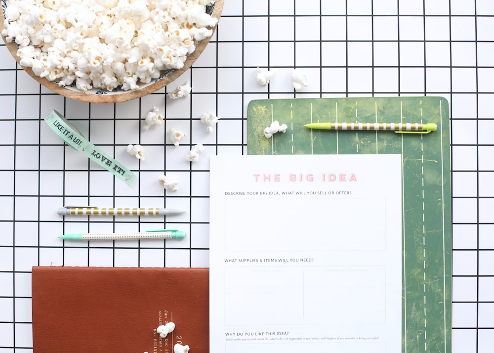 The Big Idea letter beside pens