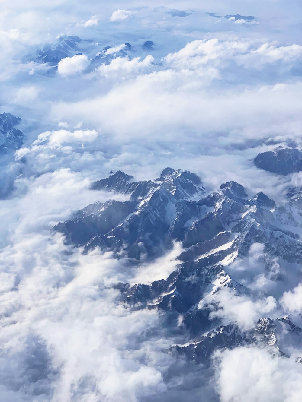aerial photography of snow capped mountain during daytime