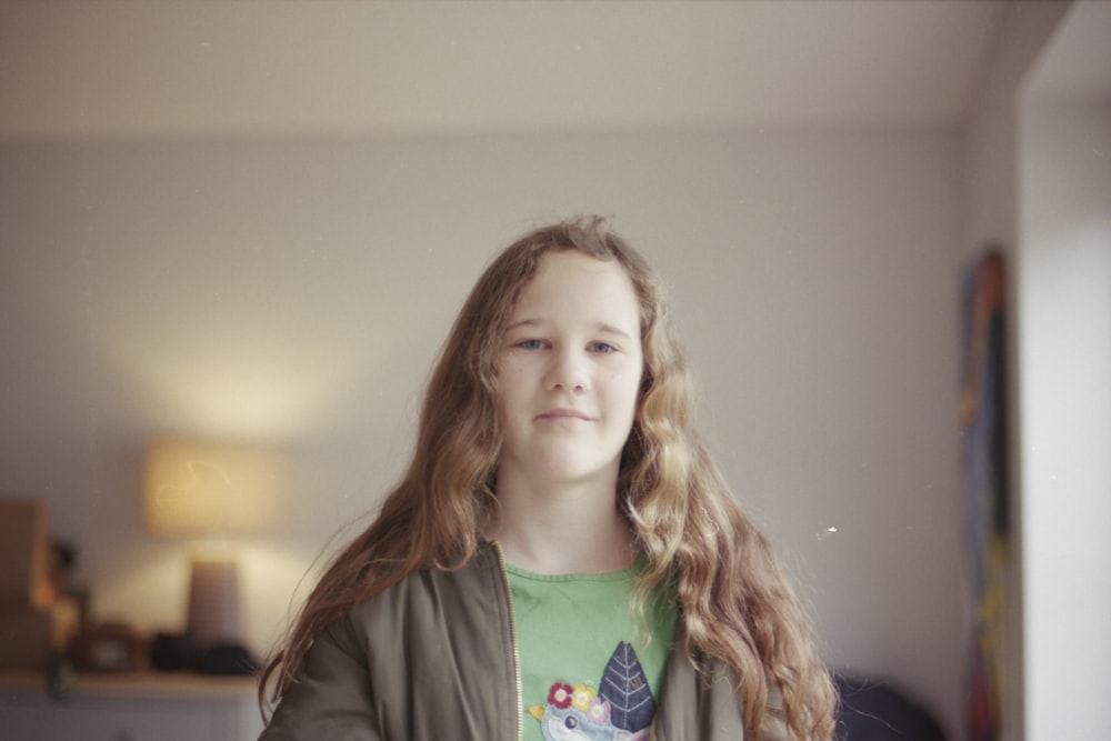 shallow focus photo of woman in gray jacket