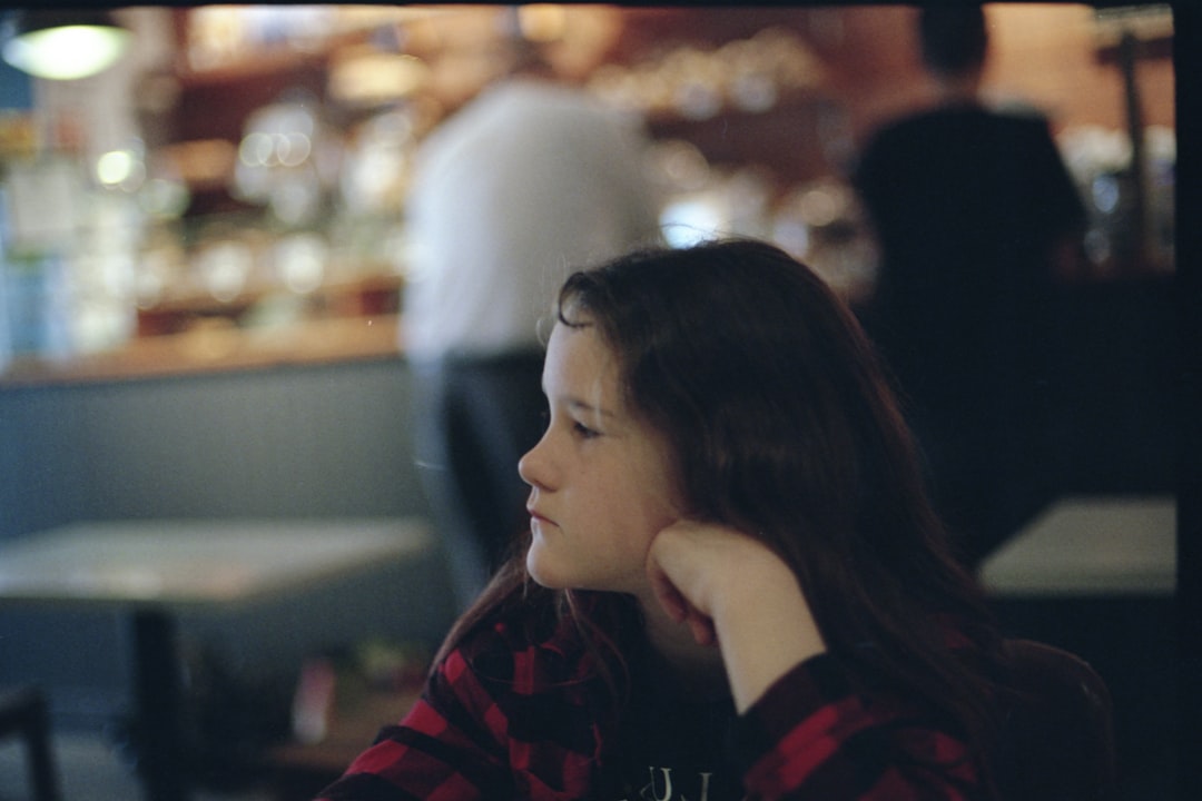 girl holding her chin