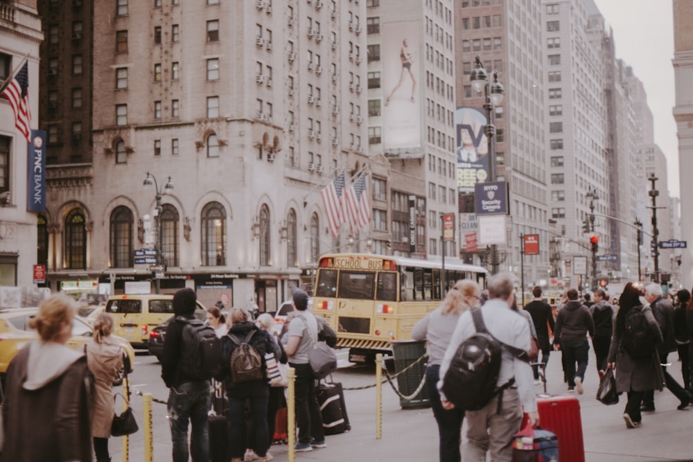 people walking beside the building