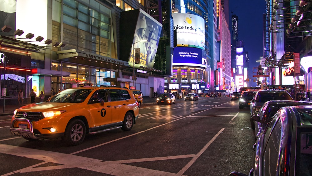 yellow SUV on road