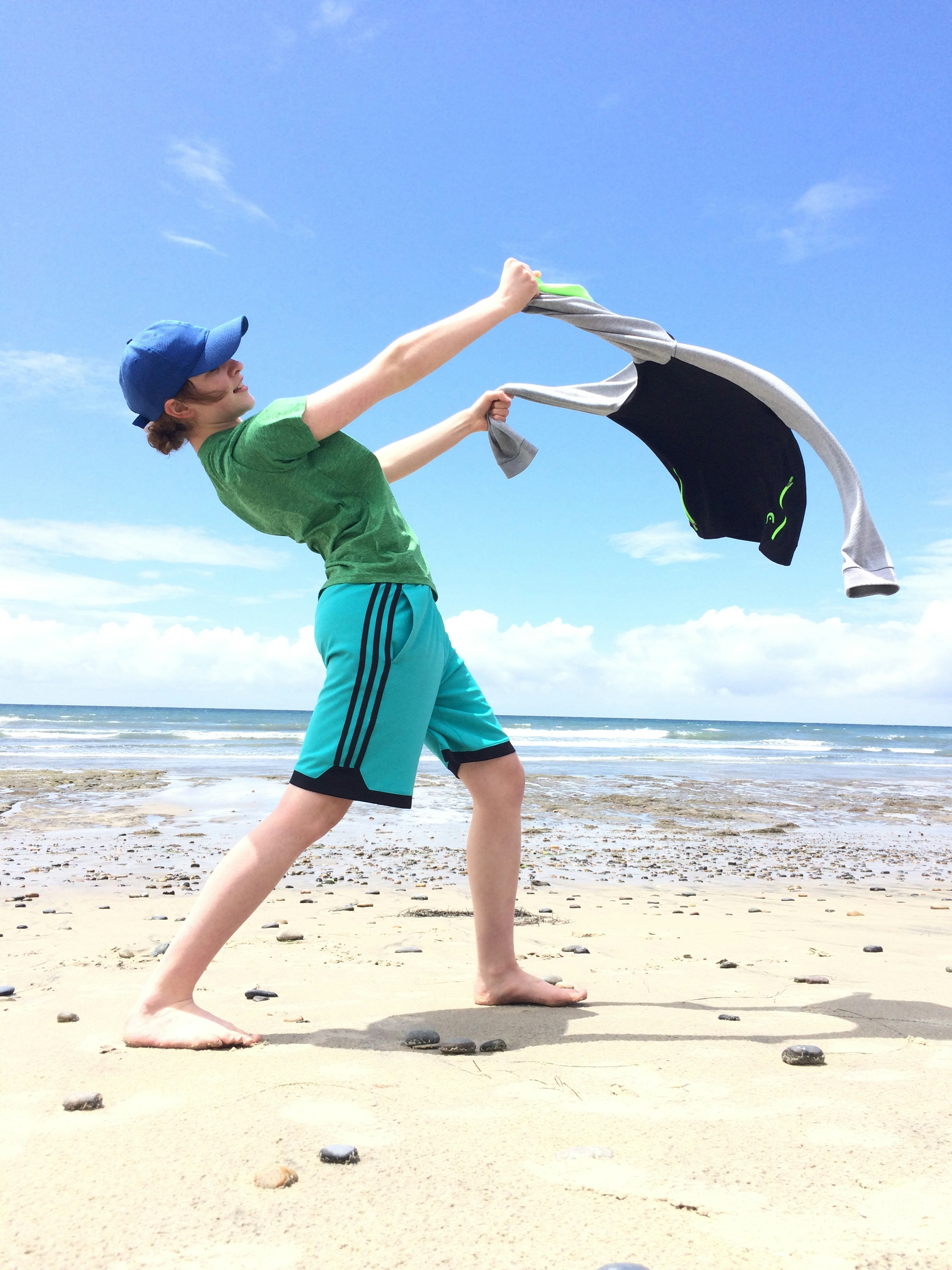 woman throwing black top