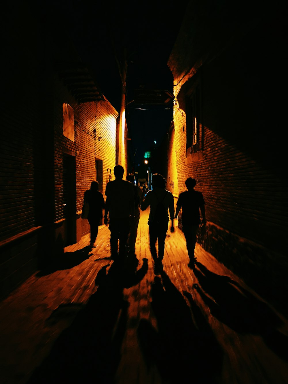 people walking in alley