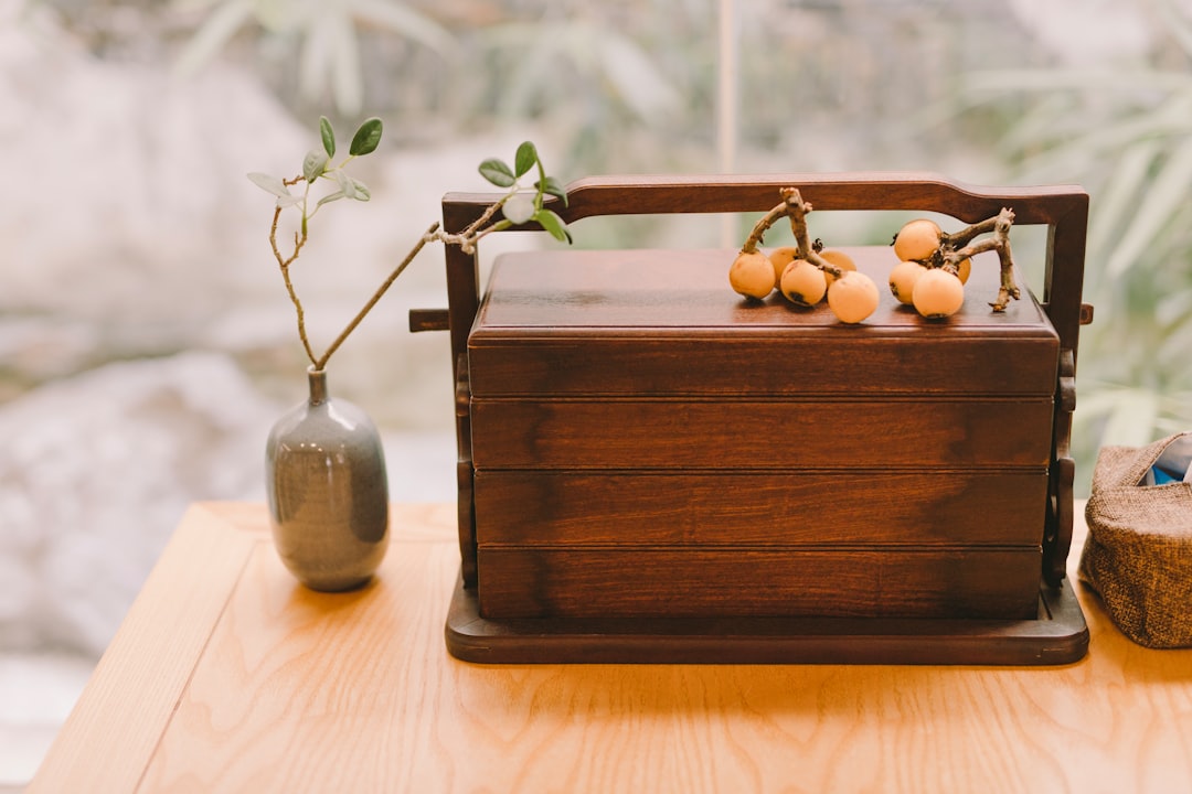 square brown wooden tiffin carrier