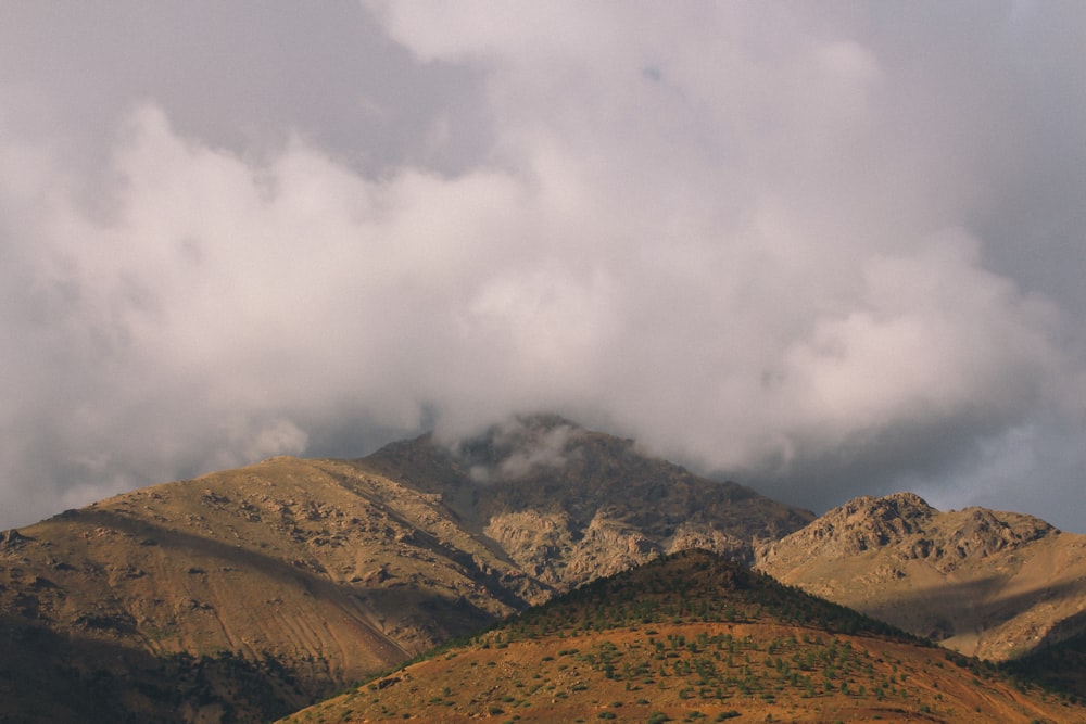 mountain under nimbus clouds