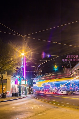 time lapse photography of road and building during nighttime