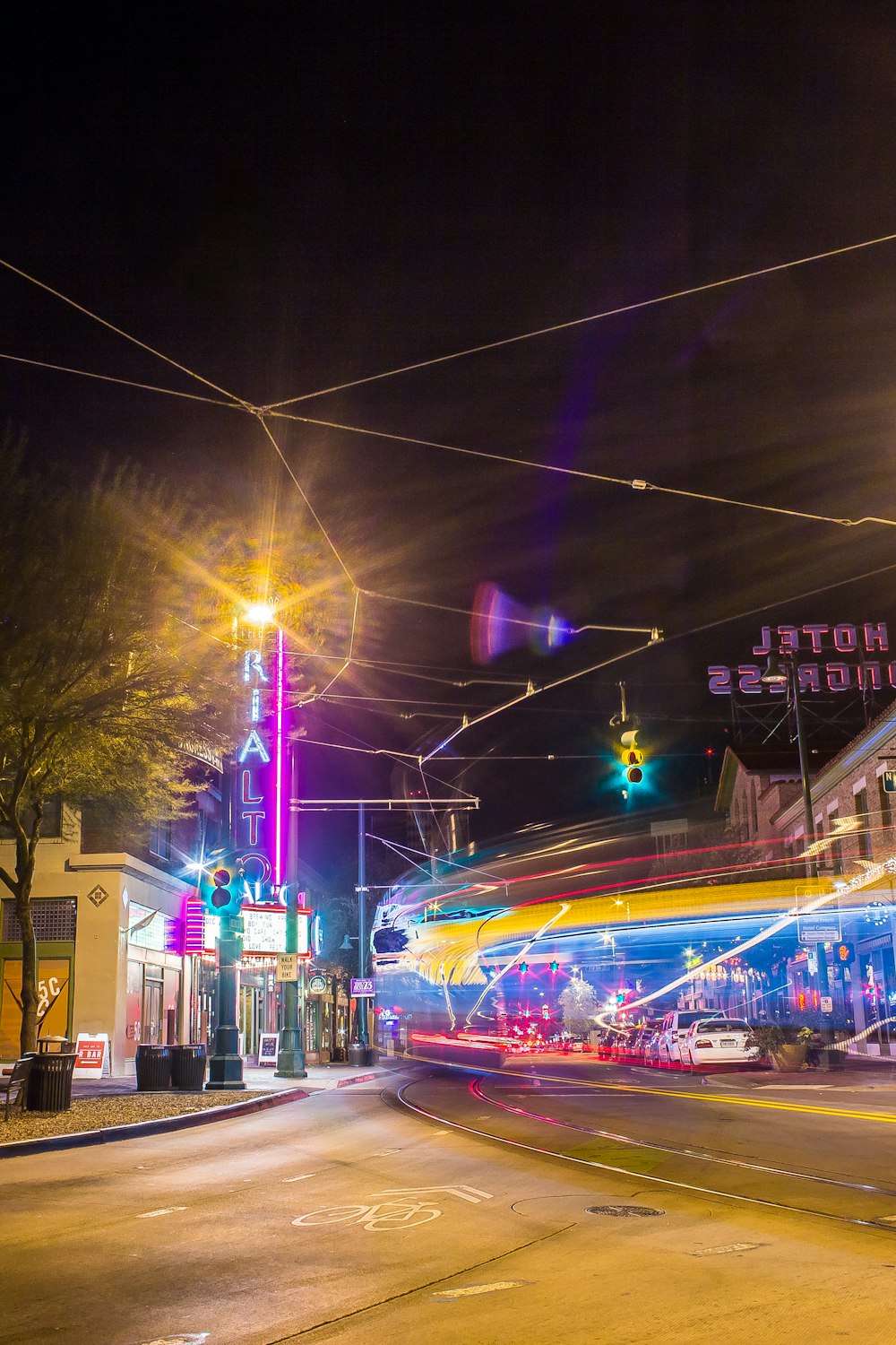 time lapse photography of road and building during nighttime