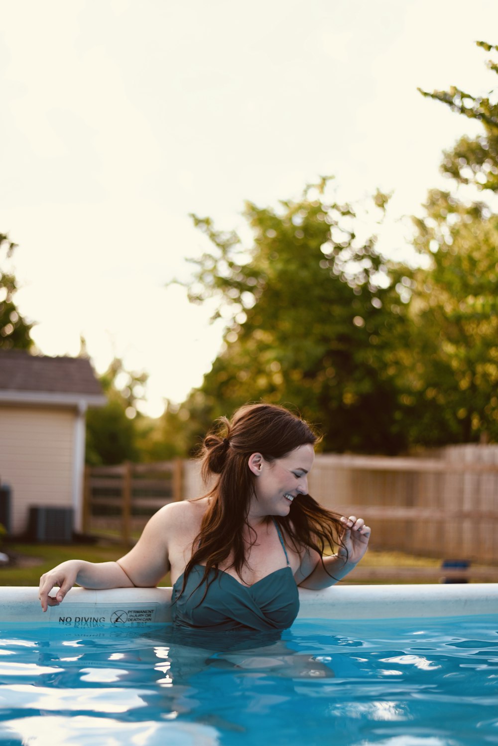 smiling woman in pool