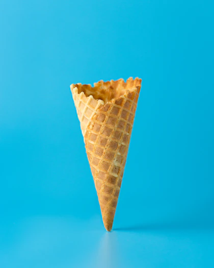 A fresh empty waffle cone ready to be filled
