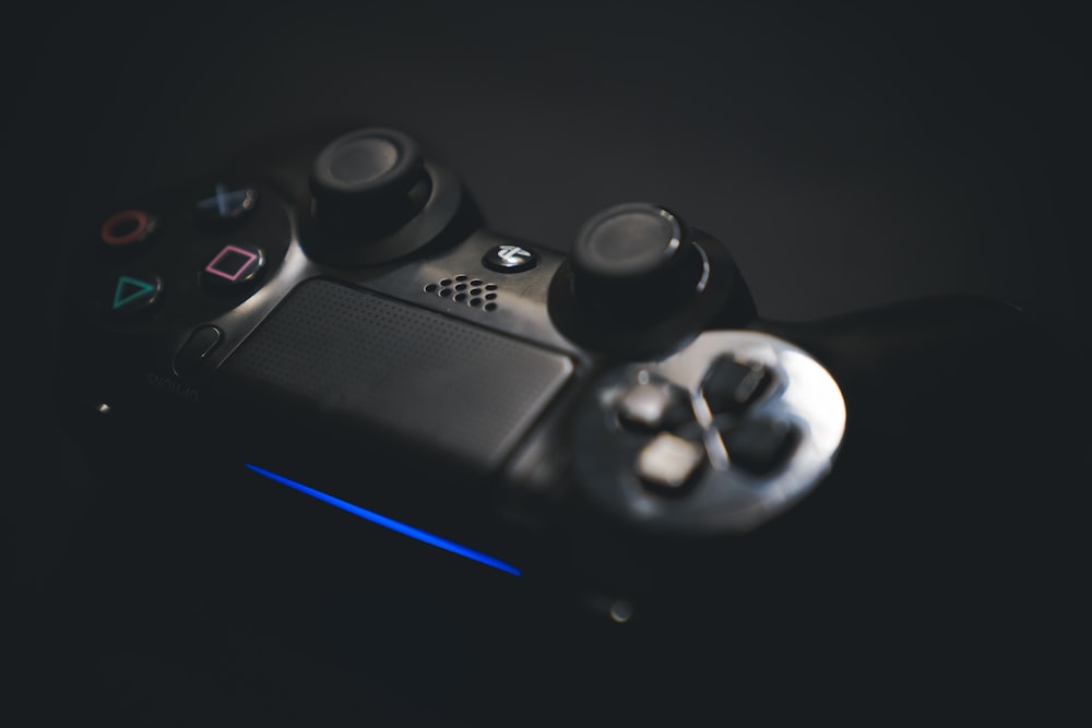 black Playstation game controller