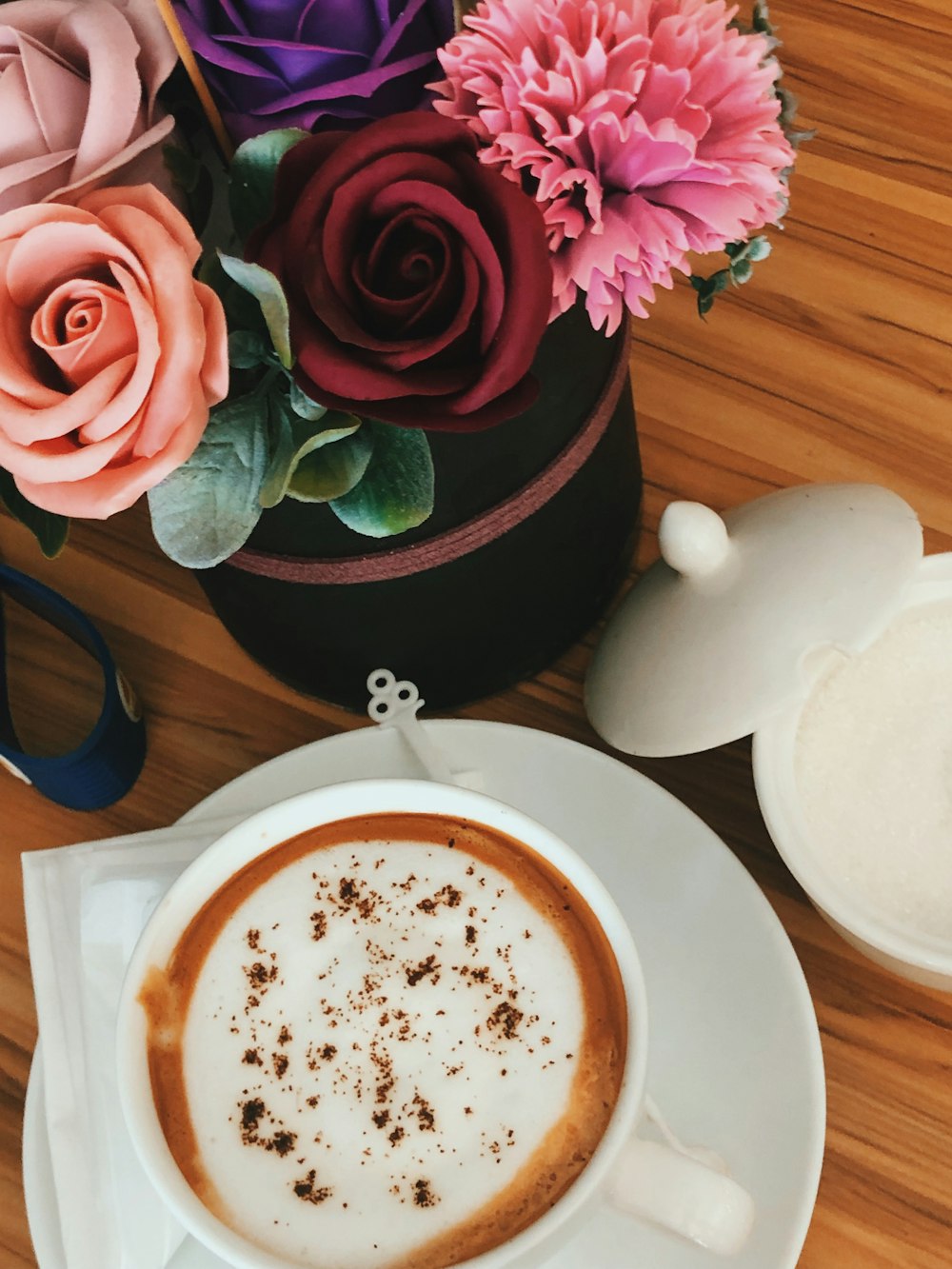 cup of latte on saucer