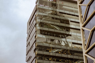 a very tall building with a clock on it's side