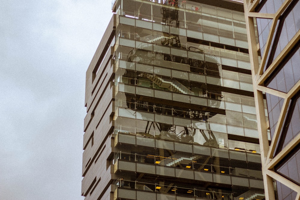 a very tall building with a clock on it's side