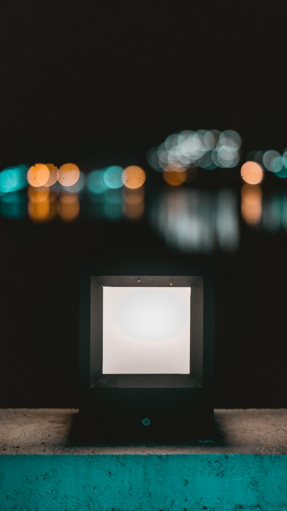 a small screen sitting on top of a table