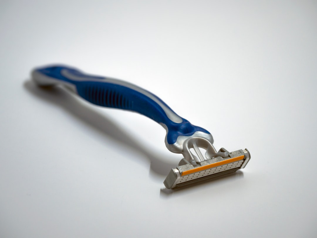 blue and silver Gillette razor