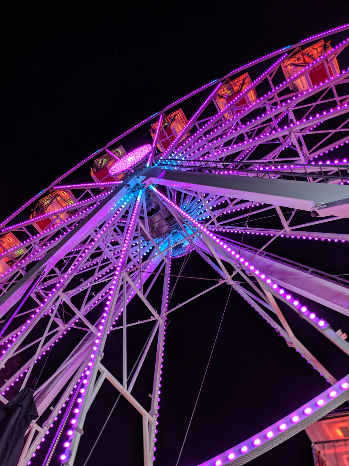 Fairground ferris wheel at night