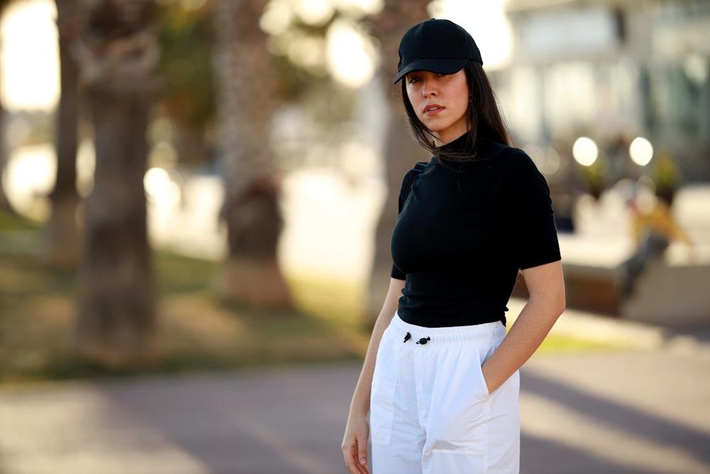 selective focus photography of woman wearing black turtle-neck elbow-sleeved shirt