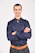 man in blue Polo by Ralph Lauren button-up long-sleeved shirt