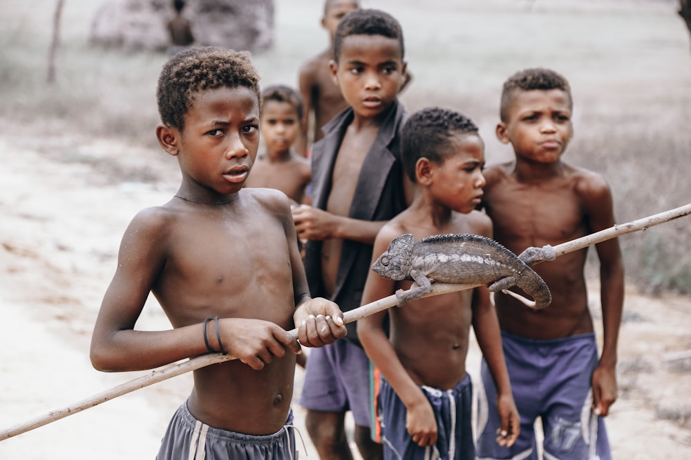 boy holding stick