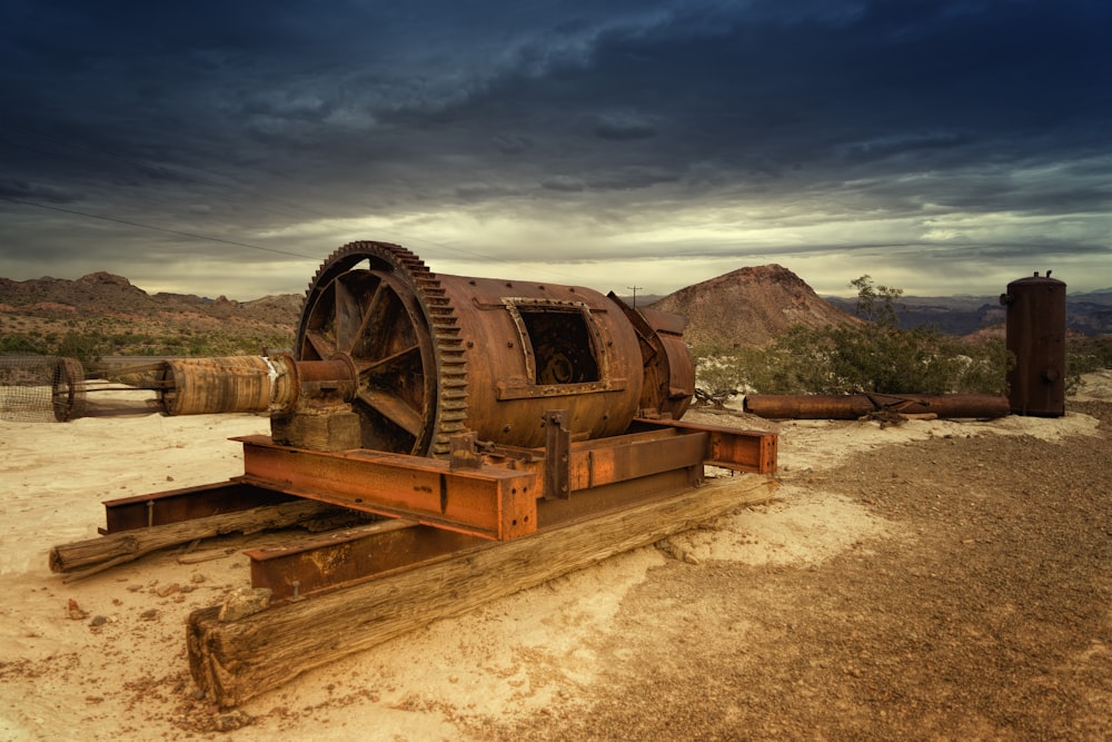 brown metal equipment on field at daytime