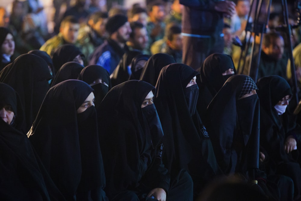women wearing black niqab