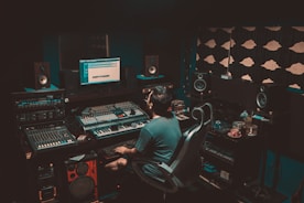 A musician recording in a professional studio.