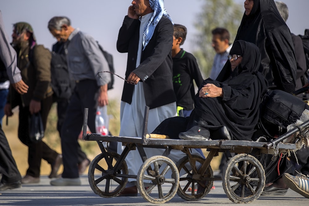 woman on a metal cart