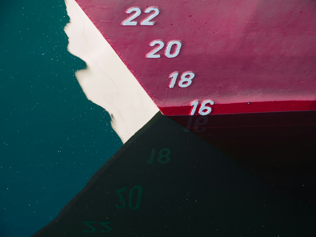 Close-up of a boat's side, useful for illustrating transportation in class trip planning tips.