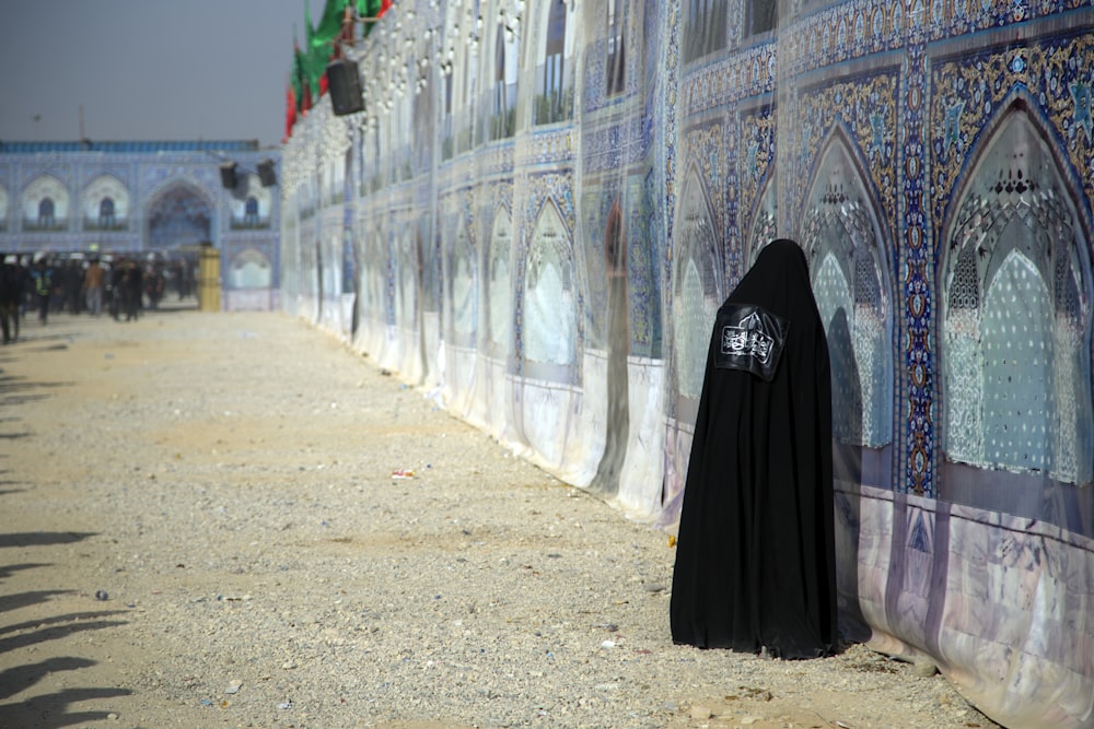 unknown person standing outdoors