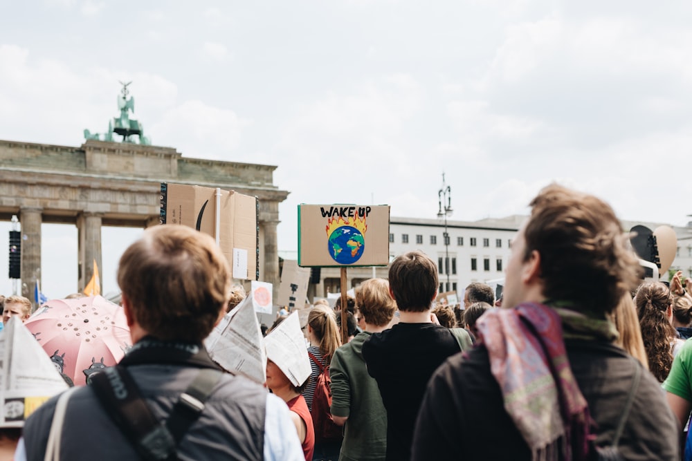 a group of people standing in front of a building