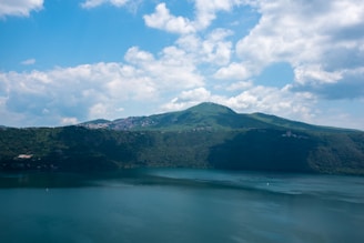 A serene landscape with a computer and a secure lock symbol.