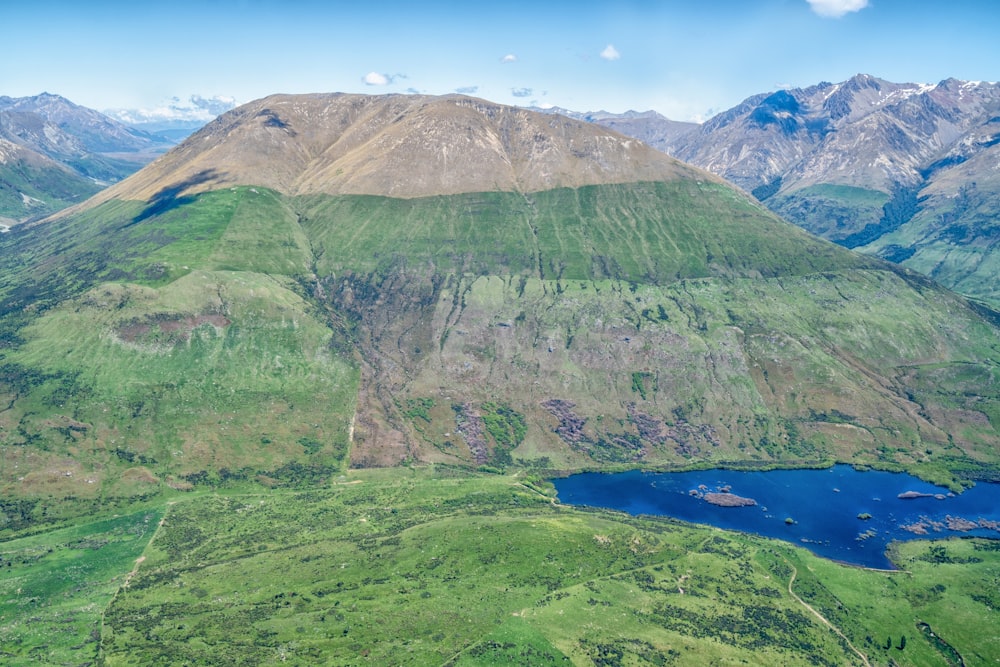 bird's eye view of a lake and mountain