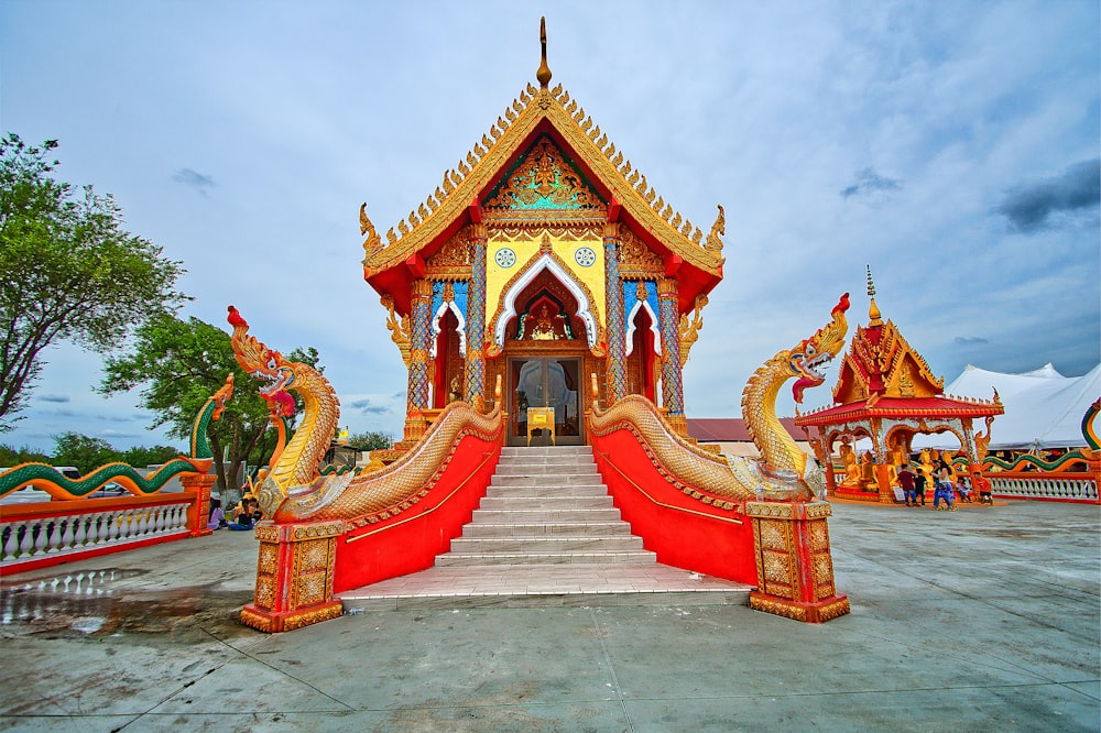 an elaborately decorated building with steps leading up to it