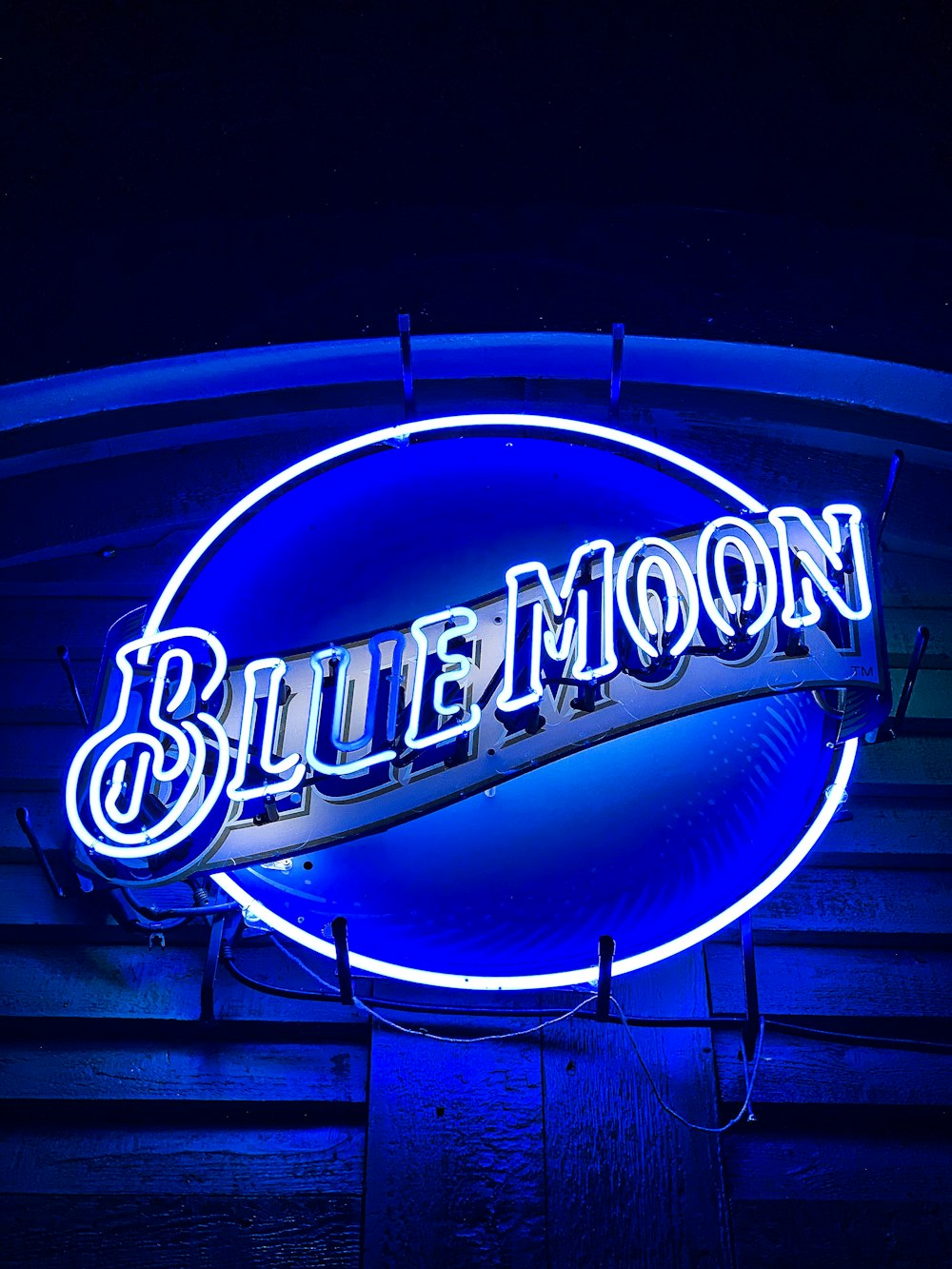 white and blue Blue Moon neon light