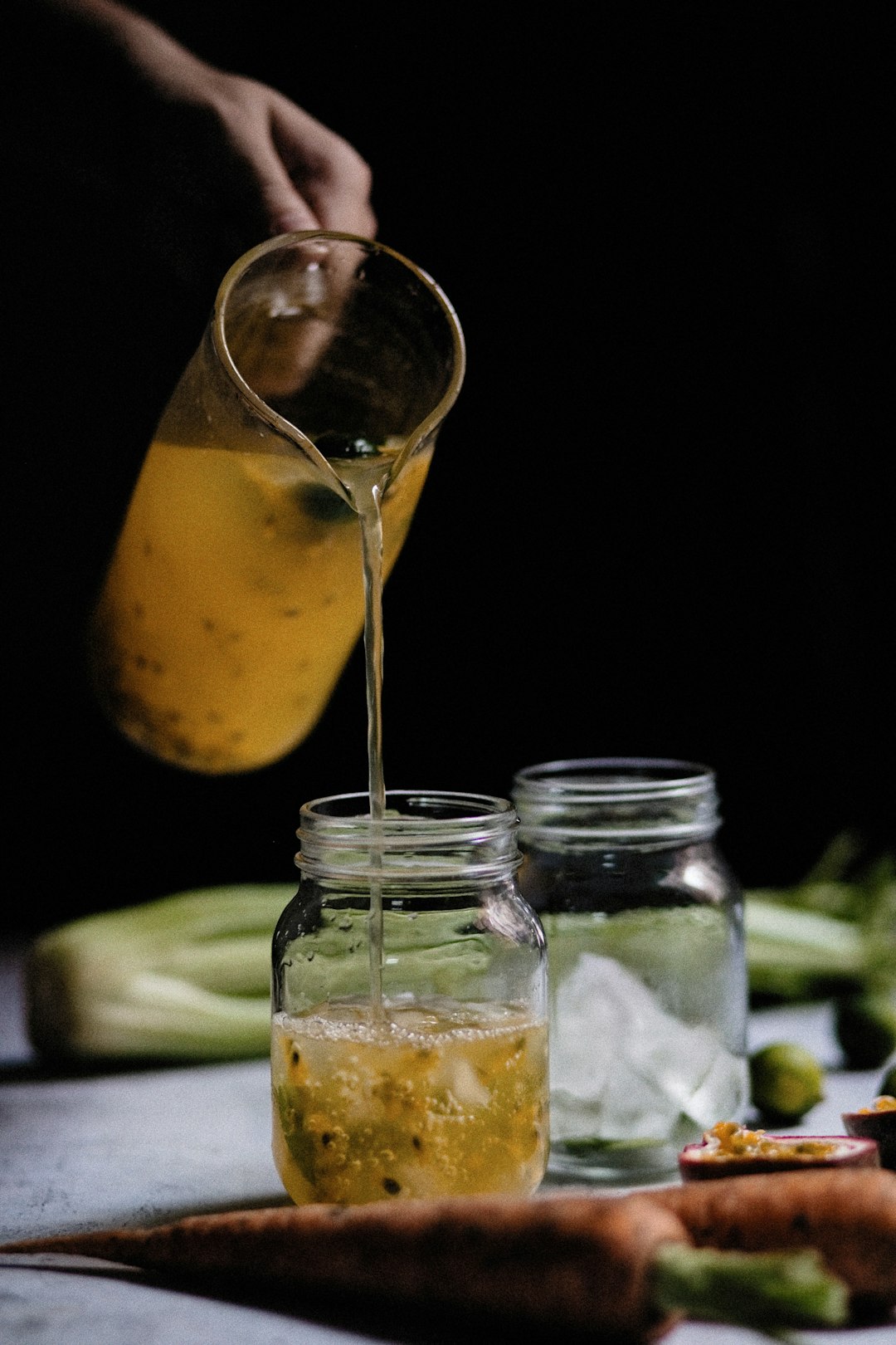 person pouring jar